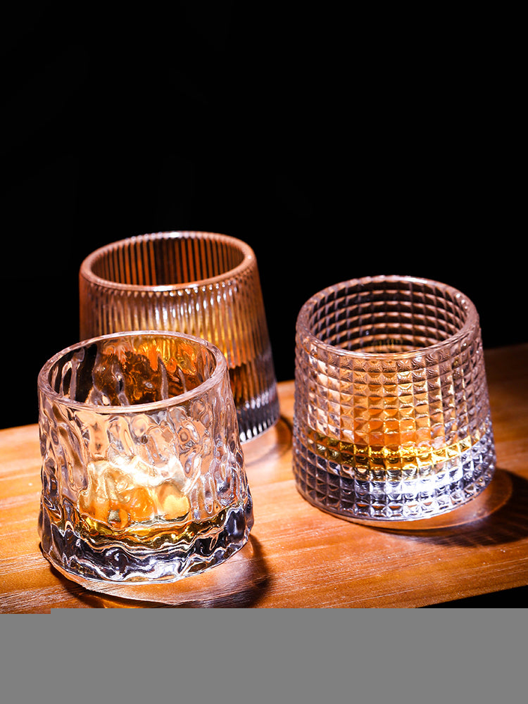 Thick Crystal Whiskey Glasses with Spinning Tops Design
