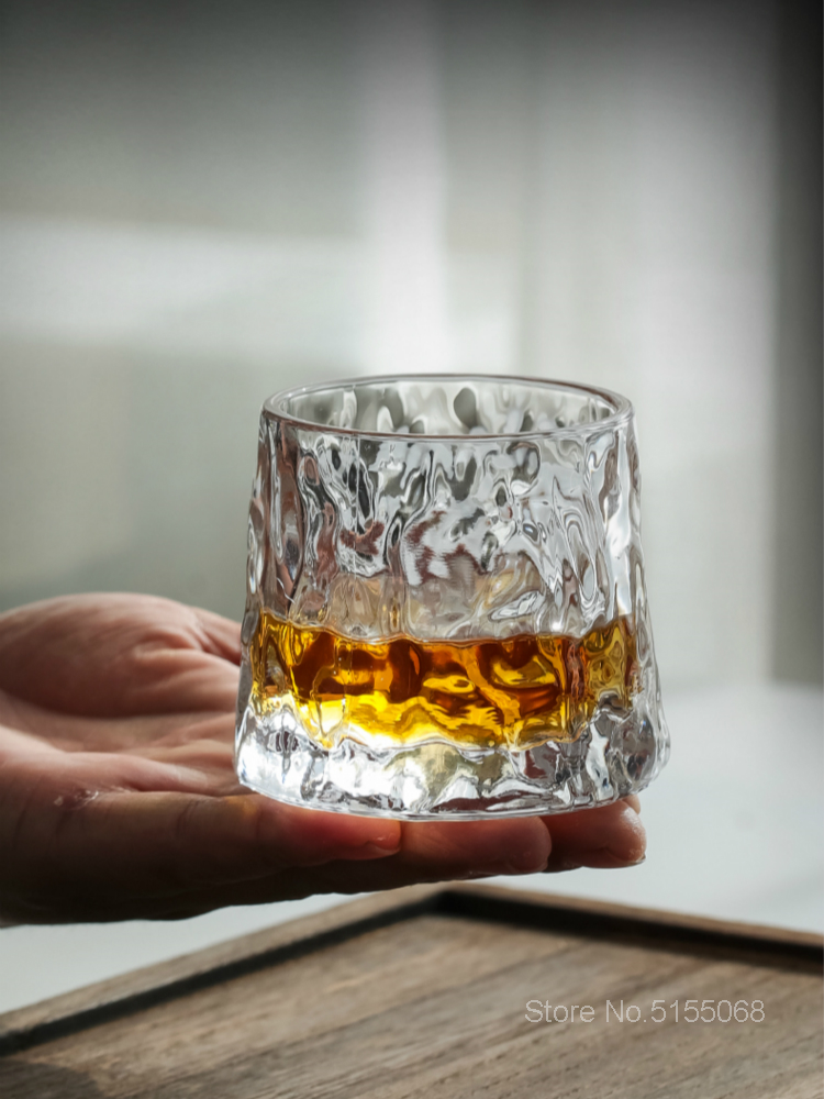 Thick Crystal Whiskey Glasses with Spinning Tops Design